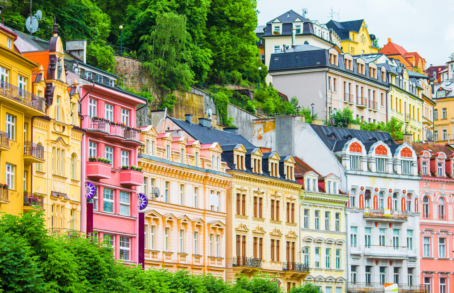 Colorful hotel buildings line the street.