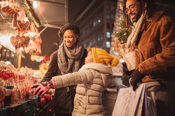 Family of three at Christmas market