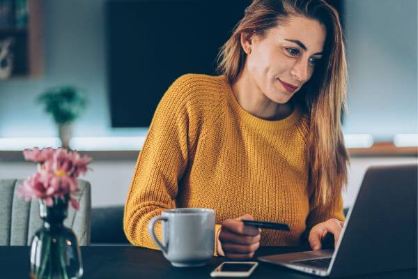 Image of women booking an online hotel stay