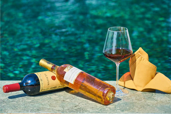 wine bottles by the pool