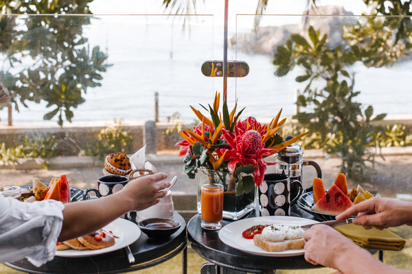 Breakfast on a patio overlooking the water